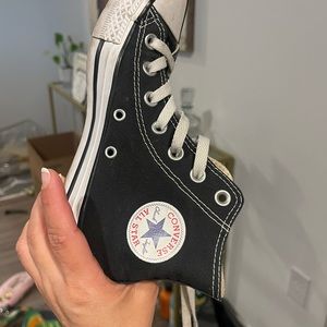 Converse black high top